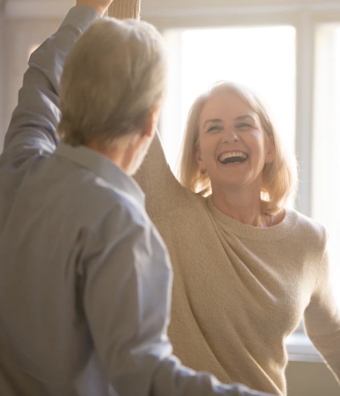 Man and woman enjoying their air conditioning installation in Huntertown, IN.